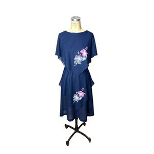 1980s vintage dress with painted flowers and handkerchief hem Size M